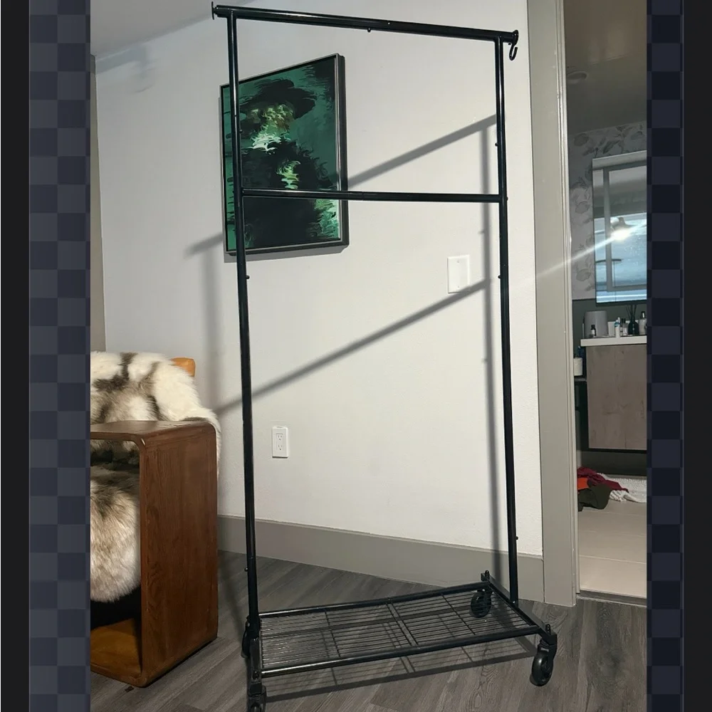 Black Metal Clothing Rack on Wheels